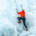 A man ice climbing.