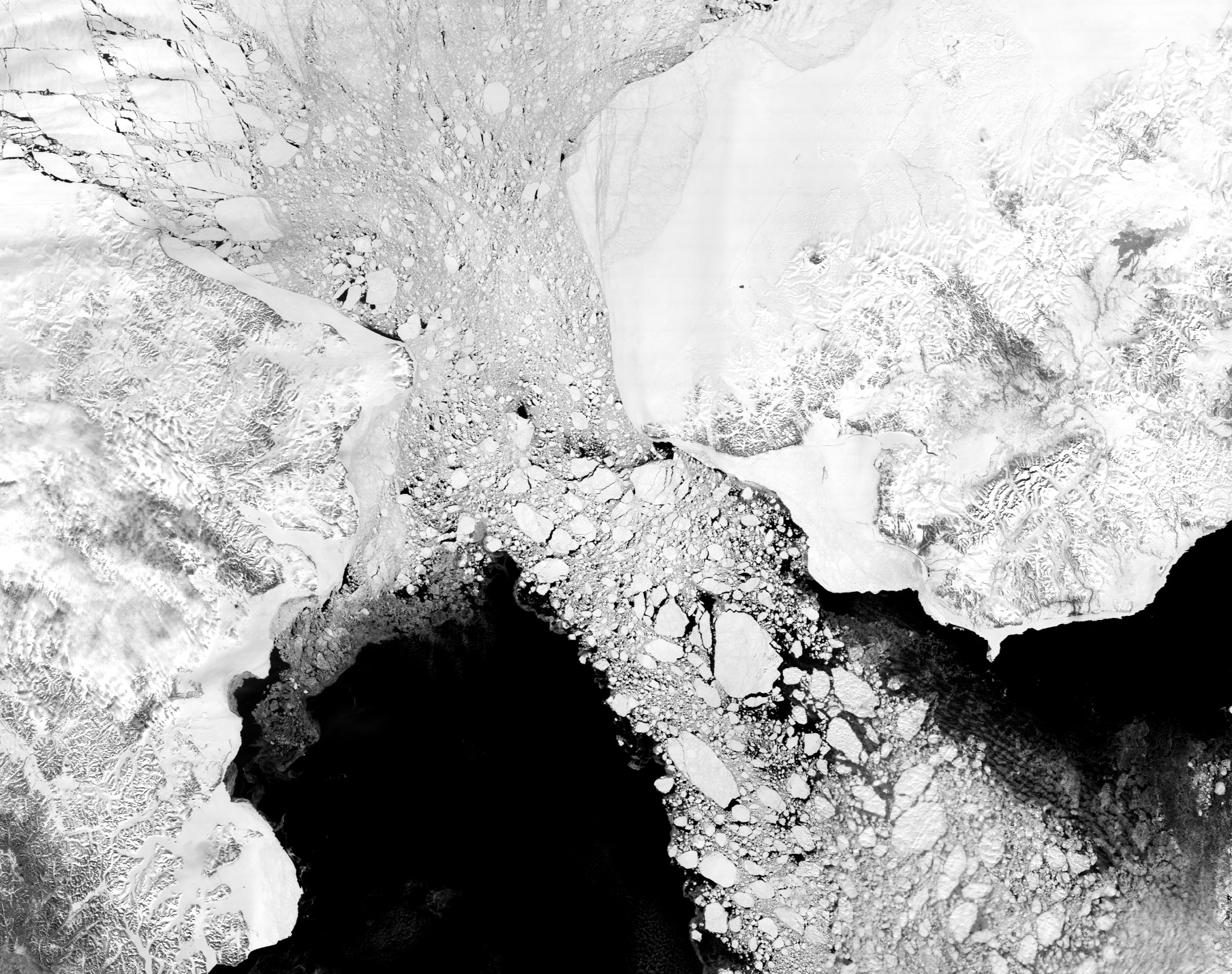 NASA satellite image of spring sea ice clogging the Bering Strait between Alaska and Russia
