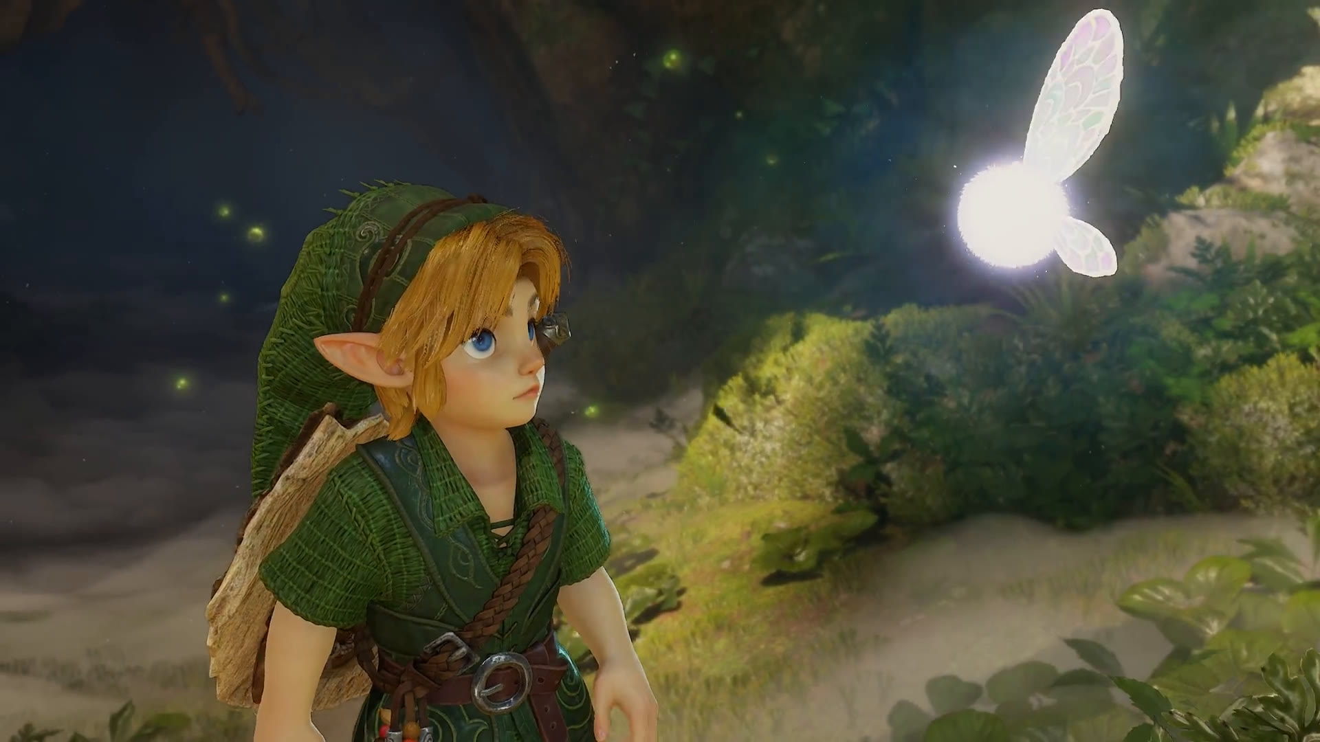 Young Link in a green tunic looking up at the glowing fairy Navi in a sunlit forest
