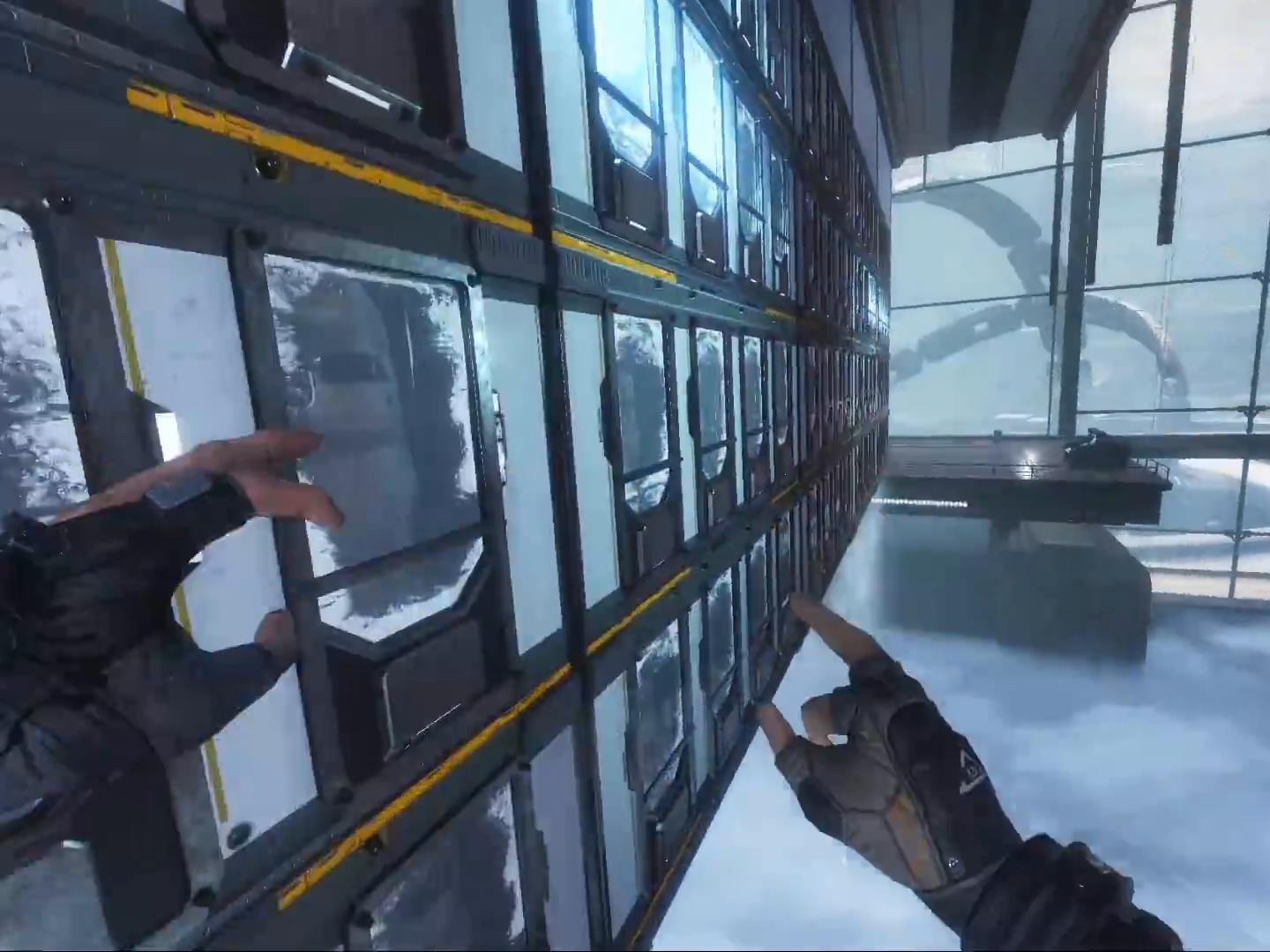 First person view of two gloved hands while running sideways along a glass wall high above a sea of clouds