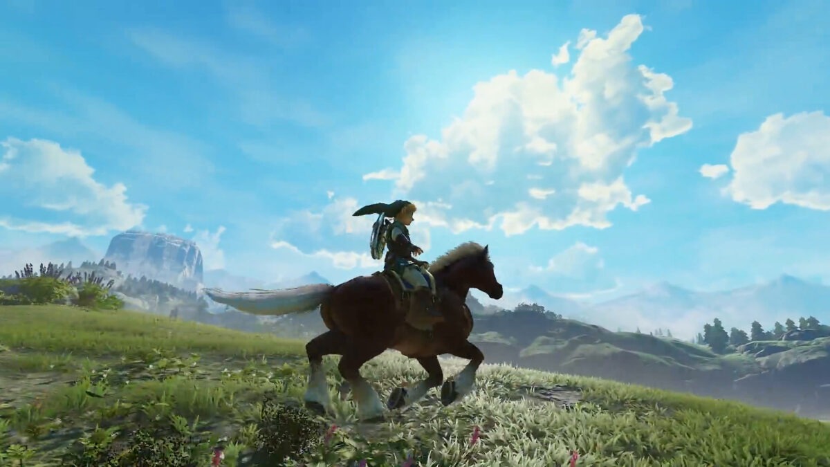 Link on horseback galloping across a sunny grassy field under a blue sky with white clouds
